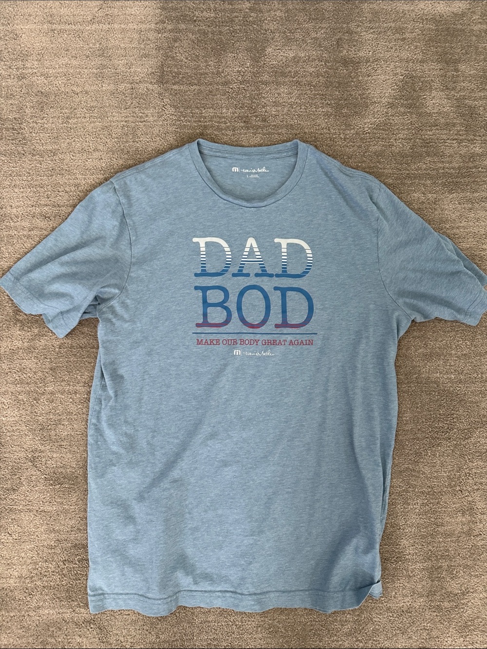 Travis Mathew Light Blue 'DAD BOD' Graphic Tee